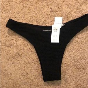 Robbed black high leg bikini bottoms